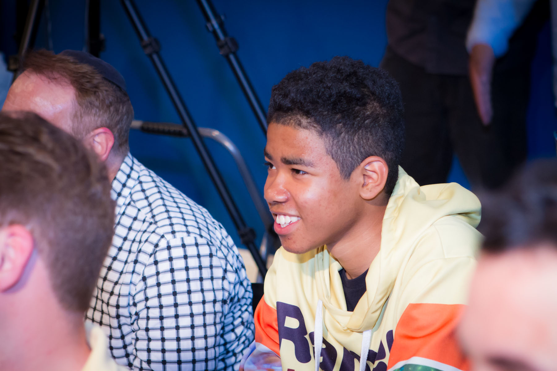 Young man attending BOND event