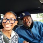 Zara takes a "selfie" with her father Derrick